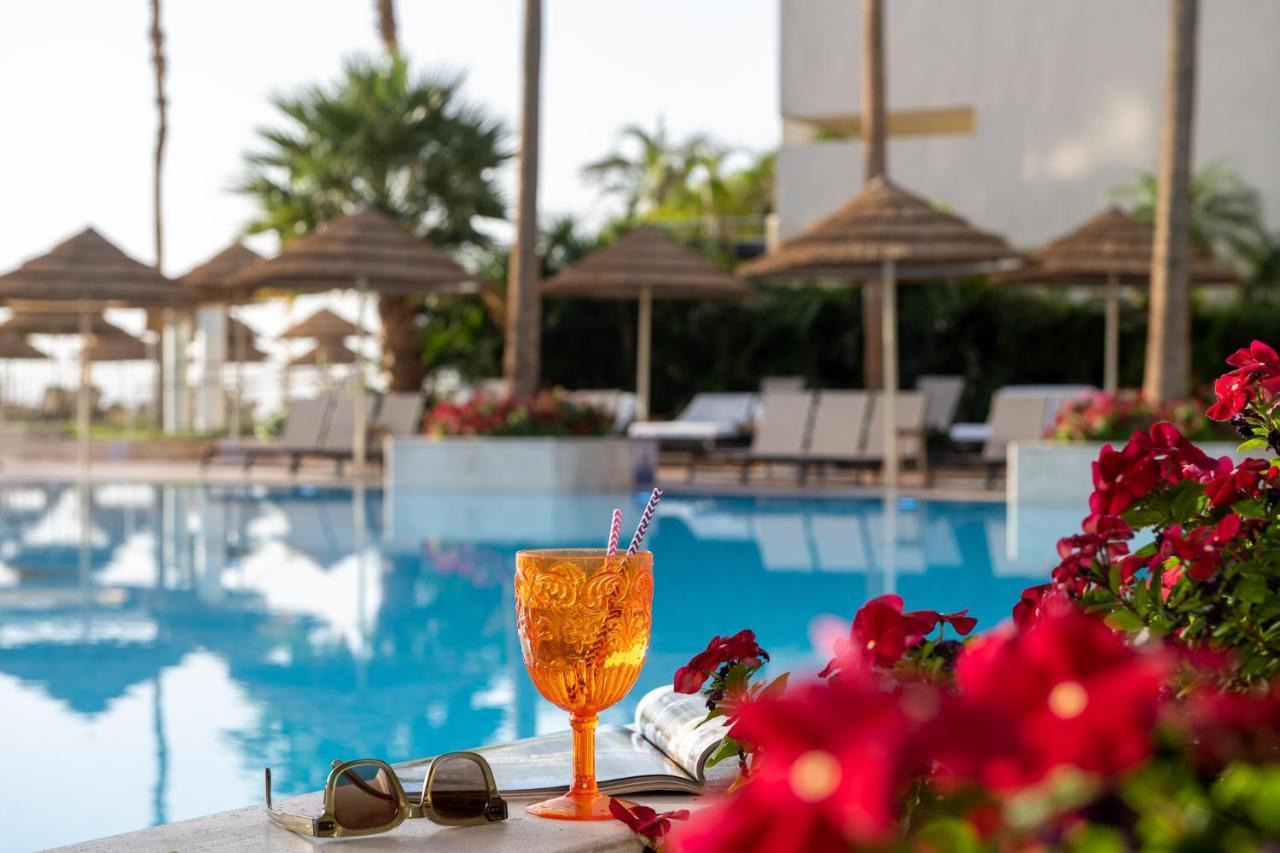 Aria Hotel Ейлат Екстериор снимка A glass of Aperol Spritz